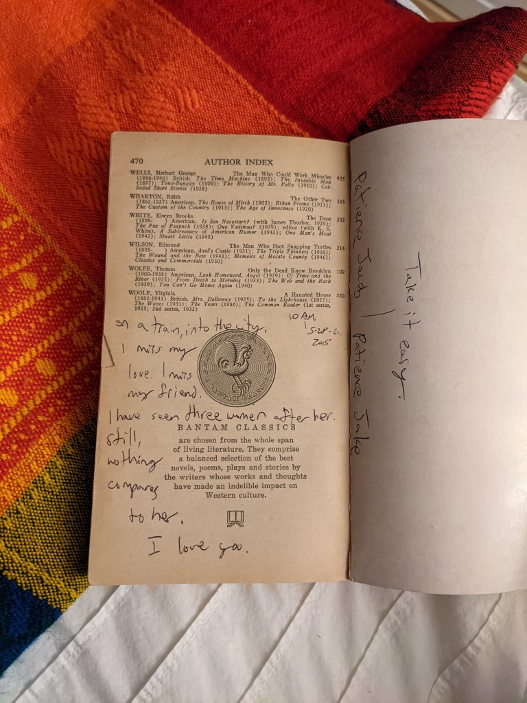 Image of inside back page of Fifty Great Short Stories paperback showing handwritten note on last page and inside of back book cover
